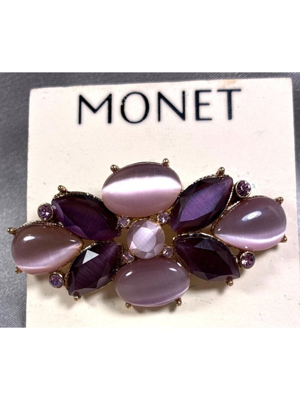 Vintage Monet Purple Cat Eye Rhinestone Brooch Gold Tone Signed 2 Inch